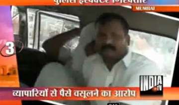 mumbai police inspector caught taking bribes from... mumbai police inspector caught taking bribes from...