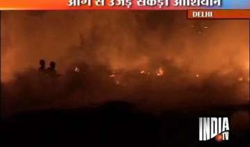 nearly 500 slum huts gutted in delhi fire - India... nearly 500 slum huts gutted in delhi fire - India...