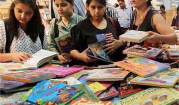 school children line up for delhi book fair -... school children line up for delhi book fair -...