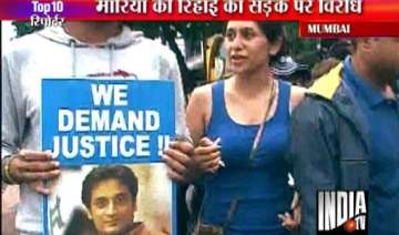 supporters of slain neeraj grover hold protest... supporters of slain neeraj grover hold protest...