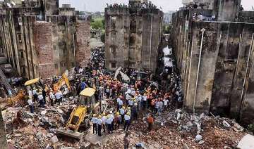 11 dead in vadodara building collapse probe... 11 dead in vadodara building collapse probe...