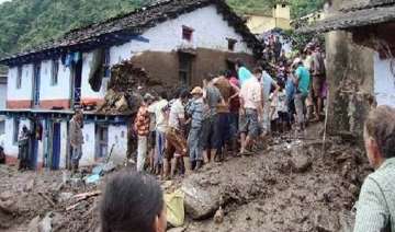 woman washed away in cloudburst rains lash... woman washed away in cloudburst rains lash...