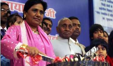 bjp accuses mayawati kin of hiding money in... bjp accuses mayawati kin of hiding money in...