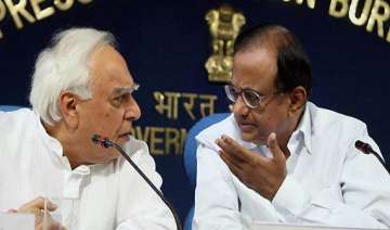 bjp slams pm for not removing chidambaram sibal -... bjp slams pm for not removing chidambaram sibal -...