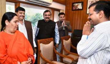 uma bharti meets kejriwal discusses plan to clean... uma bharti meets kejriwal discusses plan to clean...
