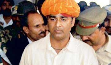 supporters of bjp mla sangit som burn effigy of... supporters of bjp mla sangit som burn effigy of...