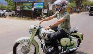 dhoni fined for faulty display of number plate on... dhoni fined for faulty display of number plate on...