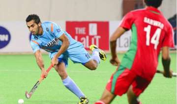 hockey midfielder dharamvir reaches 100... hockey midfielder dharamvir reaches 100...
