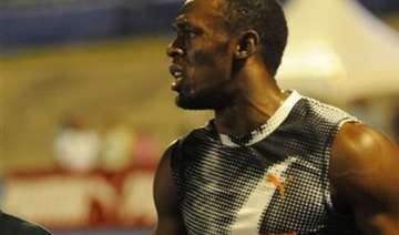 bolt starts slow but still wins semifinal heat -... bolt starts slow but still wins semifinal heat -...