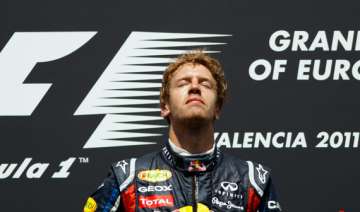 with little drama vettel easily wins f1 title -... with little drama vettel easily wins f1 title -...