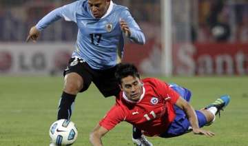 chile draws 1 1 with uruguay - India TV chile draws 1 1 with uruguay - India TV