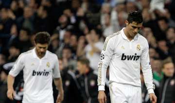madrid follows barcelona in champions league exit... madrid follows barcelona in champions league exit...