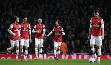 swansea draws 2 2 at arsenal in english premier... swansea draws 2 2 at arsenal in english premier...