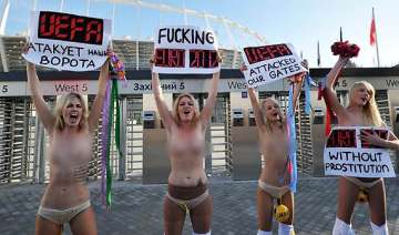 ukraine women activists strip to protest euro... ukraine women activists strip to protest euro...