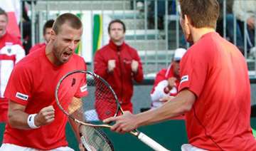 austria wins doubles to reduce spain s lead to 2... austria wins doubles to reduce spain s lead to 2...
