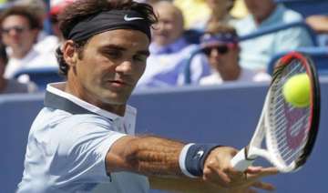 federer overcomes slow start to beat haas - India... federer overcomes slow start to beat haas - India...