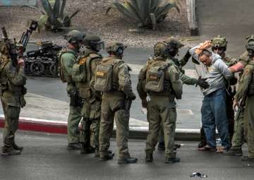 Gunman surrenders after shooting that killed one... Gunman surrenders after shooting that killed one...