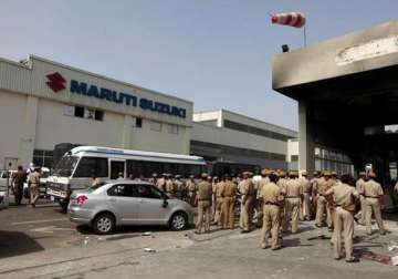 File pic - Police personnel at Maruti factory in... File pic - Police personnel at Maruti factory in...