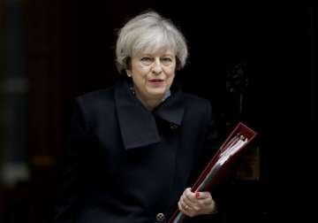 File pic - Theresa May outside 10 Downing Street... File pic - Theresa May outside 10 Downing Street...
