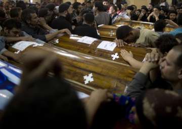 Relatives of Coptic Christians who were killed... Relatives of Coptic Christians who were killed...