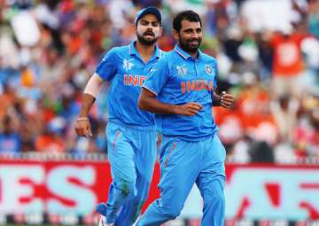 A file image of Virat Kohli and Mohammed Shami. -... A file image of Virat Kohli and Mohammed Shami. -...