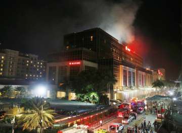 At least 36 killed after gunman sets fire to... At least 36 killed after gunman sets fire to...