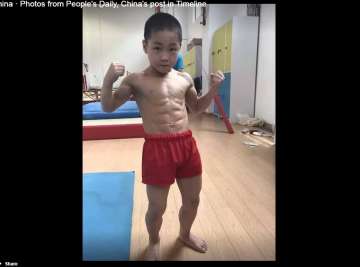 7 year old china boy with 8 pack abs 7 year old china boy with 8 pack abs