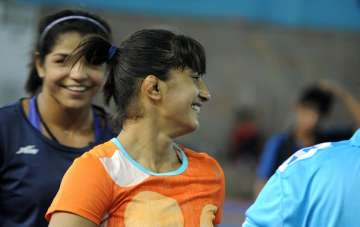Vinesh Phogat takes part in a practice session at... Vinesh Phogat takes part in a practice session at...