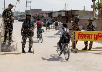 File pic - Security forces at Satnam Chowk, the... File pic - Security forces at Satnam Chowk, the...