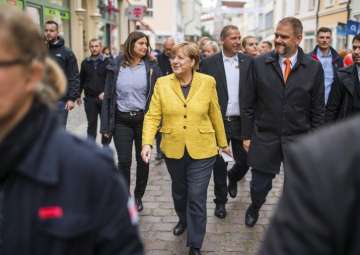 Angela Merkel takes a stroll through the old town... Angela Merkel takes a stroll through the old town...