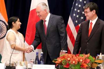 Sushma Swaraj with Rex Tillerson and Taro Kono -... Sushma Swaraj with Rex Tillerson and Taro Kono -...
