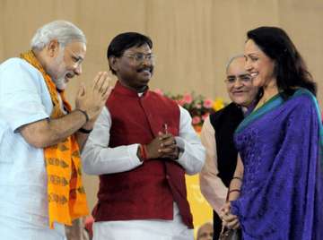 PM Modi with BJP MP Hema Malini and ex CM of... PM Modi with BJP MP Hema Malini and ex CM of...