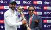 A file image of Virat Kohli holding the ICC Test mace