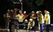 Firefighters search for a 13-year-old boy in a hole near