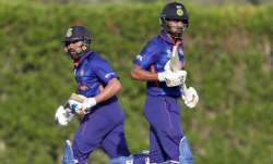 Rohit Sharma (left) and KL Rahul run between the wicket during the India vs Australia warm-up match 
