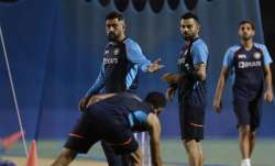 Team India mentor MS Dhoni along with skipper Virat Kohli during a practice session ahead of India's