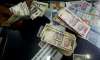 rupee drops to one week low of 63.41 vs dollar down 12 paise