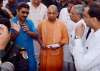 Adityanath being briefed about the bridge made on the