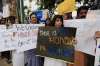 Members of civic society protesting against recent honour
