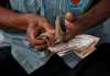 Rupee falls 24 paise, hits all-time low of 74.45 against US