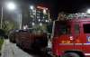 Fire fighters at AIIMS Trauma Centre after a fire in New