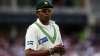 Danish Kaneria of Pakistan looks on during day three of the