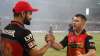Virat Kohli with David Warner