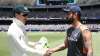 Tim Paine and Virat Kohli
