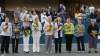 Members of the original nine women, from left to right,