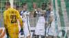 Tottenham's Harry Kane celebrates with teammates after