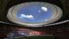 Employees prepare the National Stadium for the tomorrow's