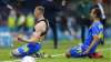 Ukraine's Artem Dovbyk, left, reacts after scoring his