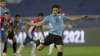 Uruguay's Edinson Cavani scores from the penalty spot
