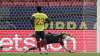 Argentina's goalkeeper Emiliano Martinez stops a penalty